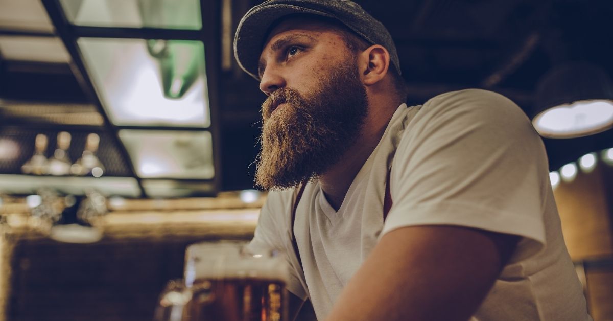 Bearded guy drinking beer