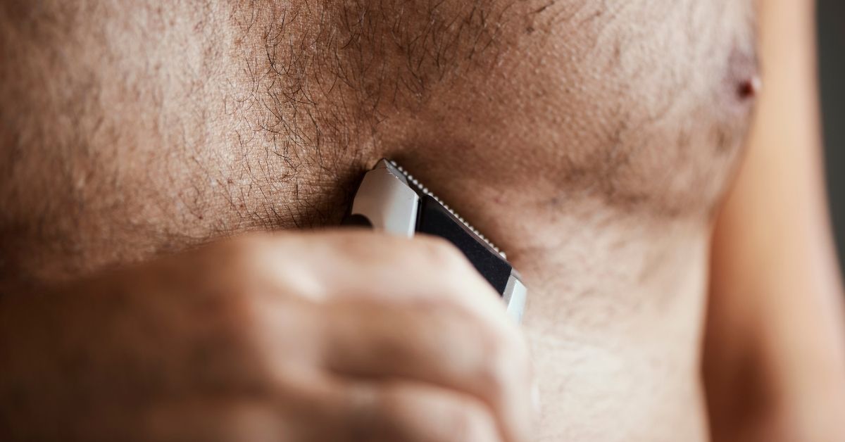 Man Trimming His Chest with an Electric Trimmer