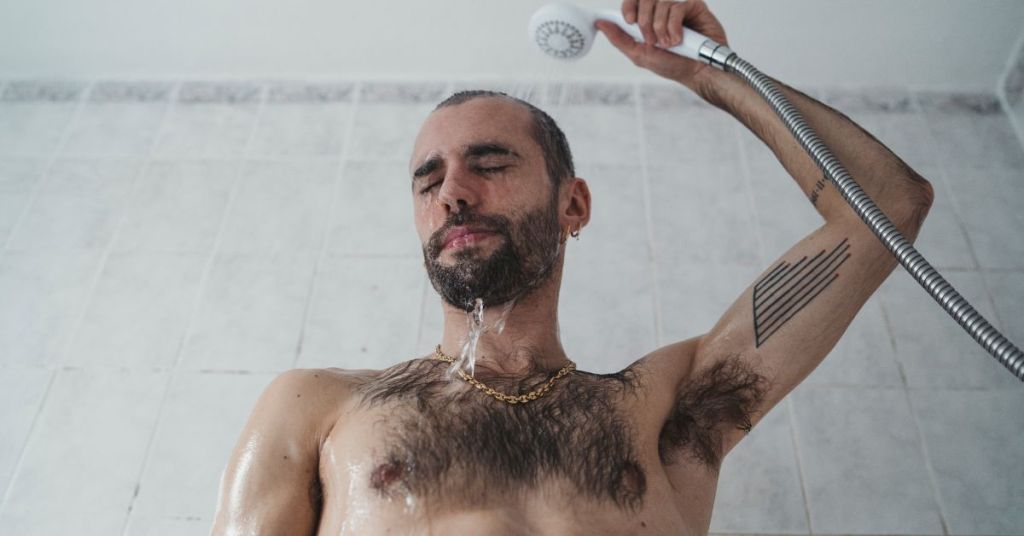 Man taking hot shower