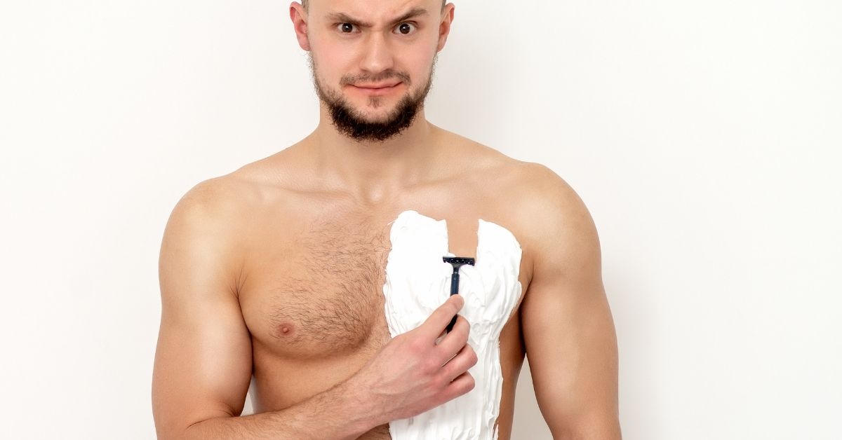 man shaving chest downwards
