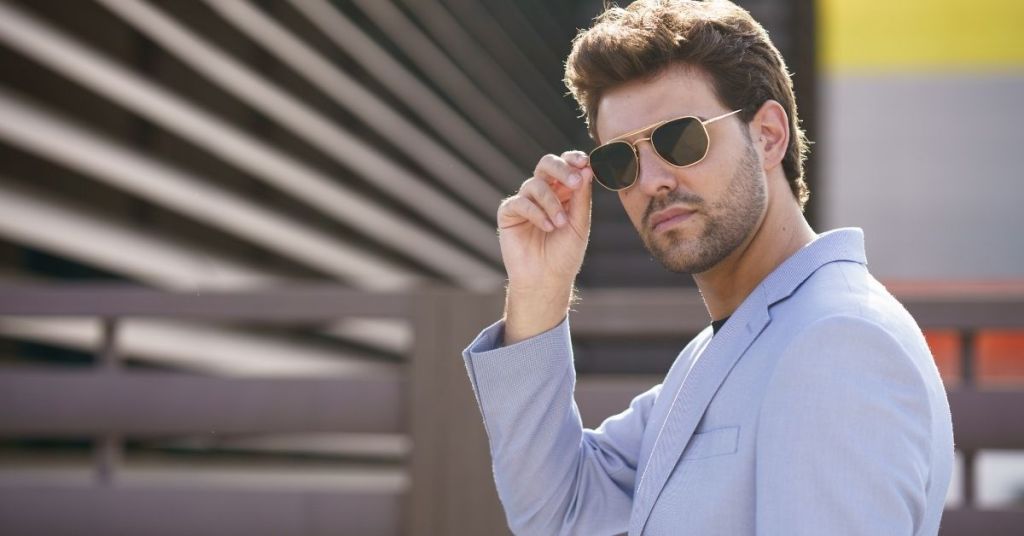 man wearing sunglass to protect from harmful UV rays.
