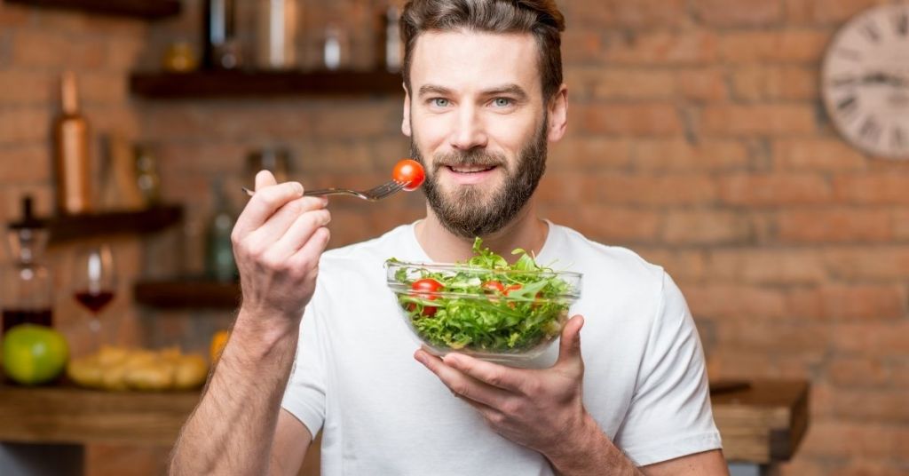 Man eating healthy food for overall good health