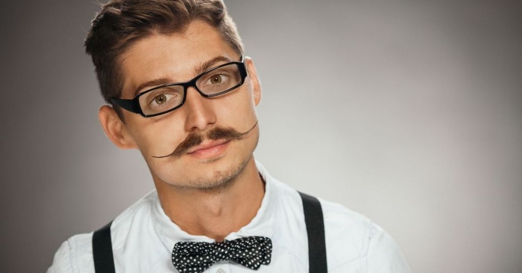Man with mustache achieving the look of how to look older