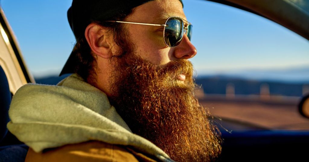 Bearded man driving